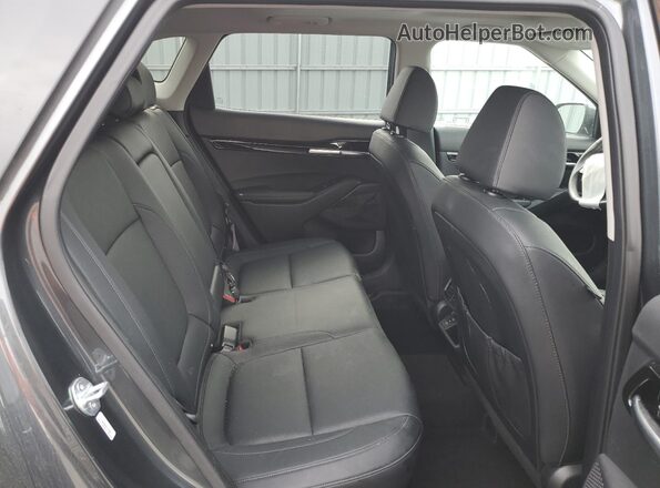 KNDETCA70R7537708 2024 KIA SELTOS Угольный Вид задней части салона