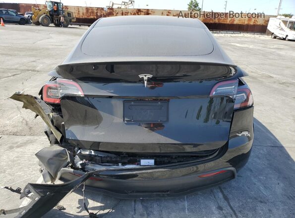 7SAYGDEFXNF317900 2022 TESLA MODEL Black Rear view