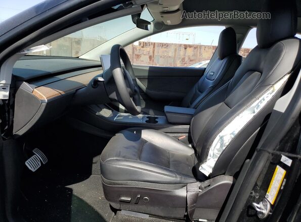 7SAYGDEFXNF317900 2022 TESLA MODEL Black Front interior view