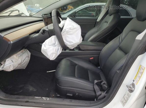 5YJ3E1EA1LF597994 2020 TESLA MODEL White Front interior view