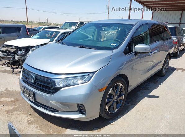 5FNRL6H94MB003172 2021 HONDA ODYSSEY Silver Vista tres cuartos delantera izquierda