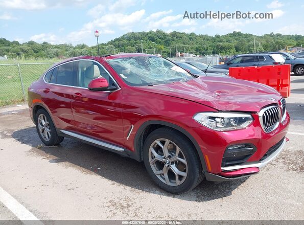 5UX2V1C03L9D10432 2020 BMW X4 Burgundy Widok wnętrza z tyłu