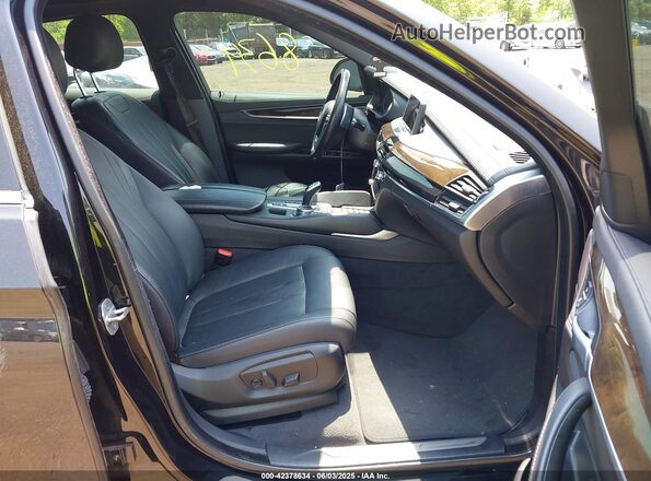 5UXKU2C58J0Z61817 2018 BMW X6 Black Vista interior delantera