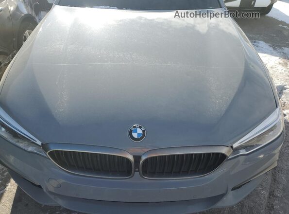 WBAJB9C50JB286445 2018 BMW M5 Gray Vista interior trasera