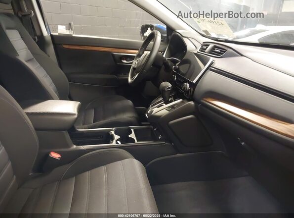 7FARW2H58ME020879 2021 HONDA CR-V Blue Vista interior delantera