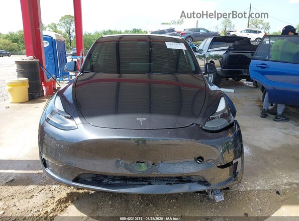 7SAYGDED6RF054342 2024 TESLA MODEL Y Gray Սարքավորումների վահանակի տեսք