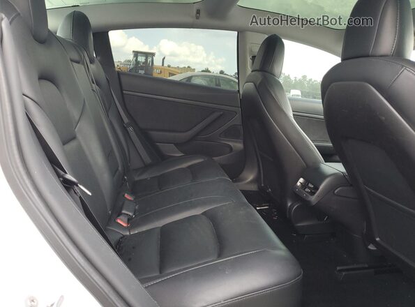 5YJ3E1EA1LF597994 2020 TESLA MODEL White Rear seats view