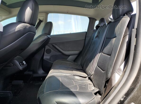 7SAYGDEFXNF317900 2022 TESLA MODEL Black Rear seats view