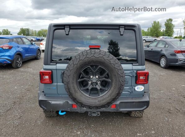 1C4RJXN62RW141494 2024 JEEP WRANGLER Gray უკანა ხედი