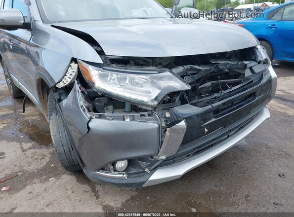 JA4JZ4AX4JZ059721 2018 MITSUBISHI OUTLANDER Gray Front view