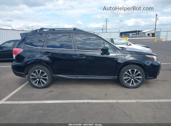 JF2SJGECXJH524164 2018 SUBARU FORESTER2. Black 