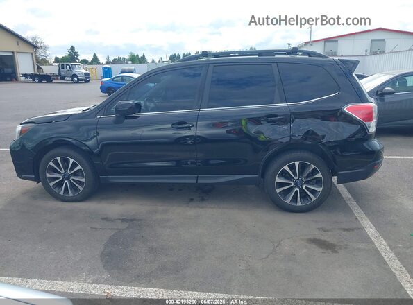 JF2SJGECXJH524164 2018 SUBARU FORESTER2. Black 