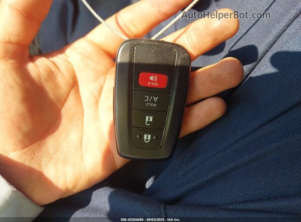 JTDKAMFP4M3169430 2021 TOYOTA LE White Առջևի վահանակի տեսք