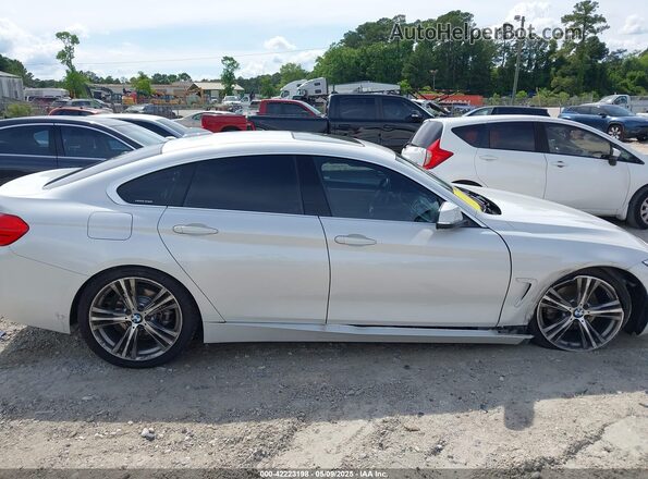 WBA4F7C52HG786500 2017 BMW 4 SERIES White Vista interior trasera