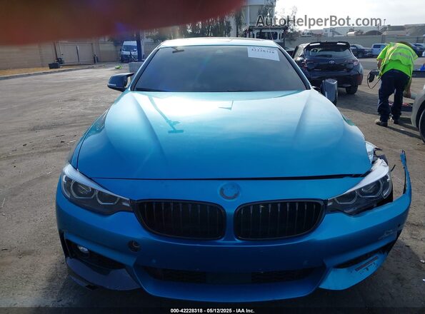 WBA4J5C56JBF07381 2018 BMW 4 SERIES Blue Սալոնի հետևի տեսք