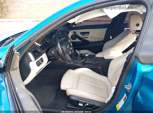 WBA4J5C56JBF07381 2018 BMW 4 SERIES Blue Սալոնի դիմացի տեսք