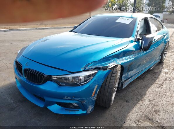 WBA4J5C56JBF07381 2018 BMW 4 SERIES Blue Առջևի ձախ երեք քառորդ տեսարան