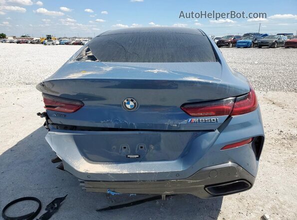 WBAGV8C06NCH98097 2022 BMW M8 Blue Вид ззаду