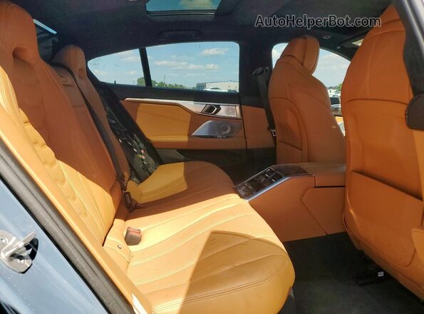 WBAGV8C06NCH98097 2022 BMW M8 Blue Вид задніх сидінь