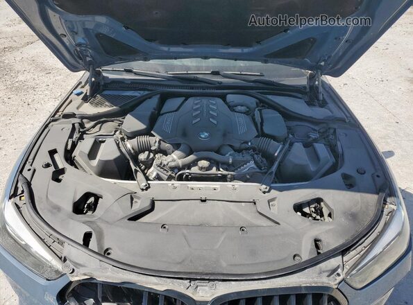 WBAGV8C06NCH98097 2022 BMW M8 Blue Вид задньої частини салону