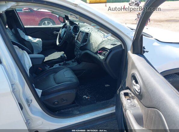 1C4PJMMB6PD110228 2023 JEEP CHEROKEE White Front interior view