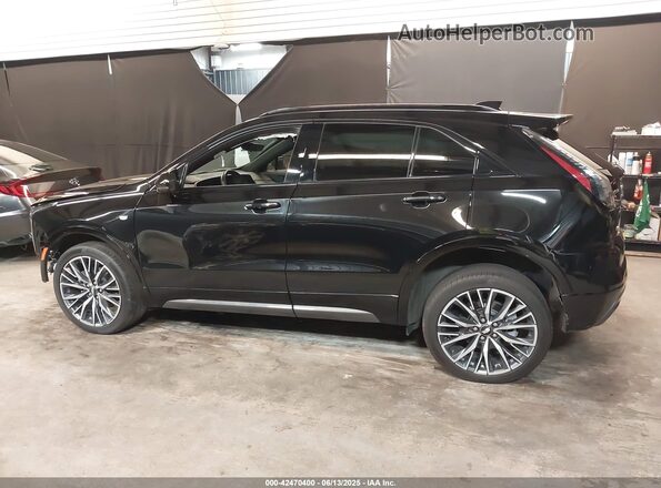 1GYFZFR40RF130034 2024 CADILLAC XT4 Черный Вид задней части салона