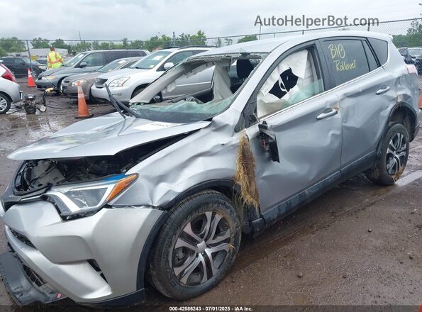 2T3BFREV3JW709681 2018 TOYOTA LE Silver Передня ліва чверть