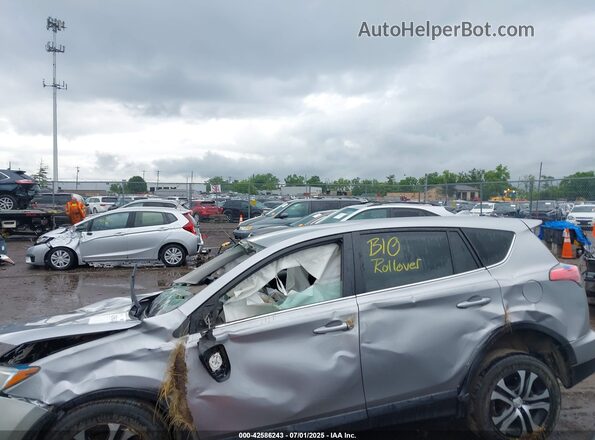 2T3BFREV3JW709681 2018 TOYOTA LE Silver 