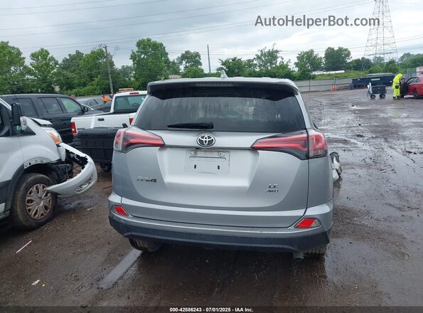 2T3BFREV3JW709681 2018 TOYOTA LE Silver 