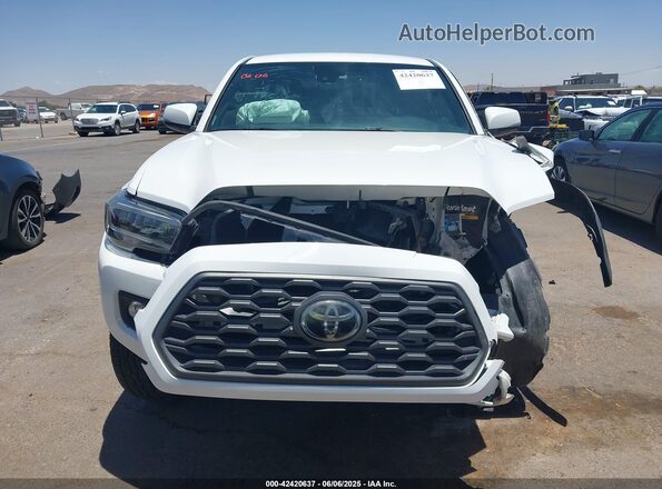3TMCZ5AN0MM395231 2021 TOYOTA TACOMA White Սալոնի հետևի տեսք