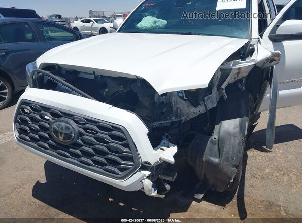 3TMCZ5AN0MM395231 2021 TOYOTA TACOMA White Դիմացի տեսք