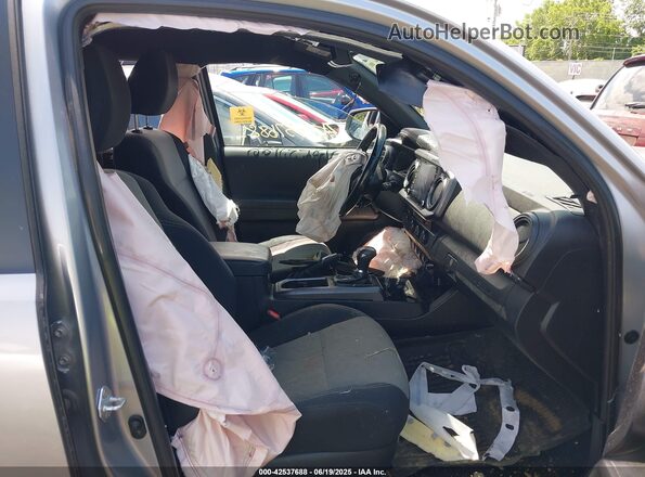 3TMCZ5AN4MM413309 2021 TOYOTA TACOMA Silver Front interior view