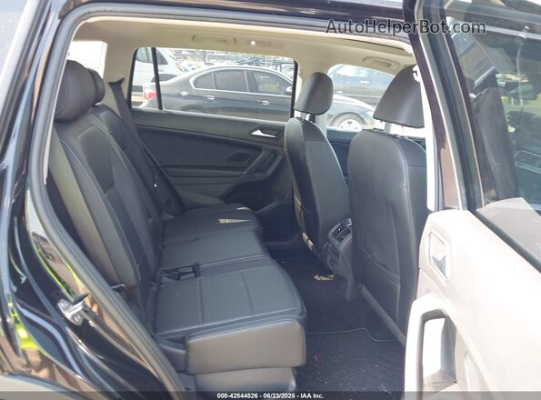 3VV2B7AX0LM034093 2020 VOLKSWAGEN TIGUAN Black VIN კოდის სტიკერის ხედი