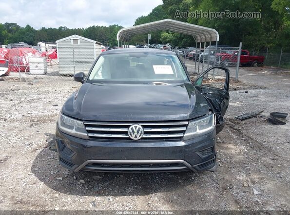 3VV2B7AX7MM114069 2021 VOLKSWAGEN TIGUAN Black Vista interior trasera