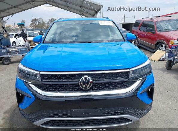 3VVEX7B22RM000201 2024 VOLKSWAGEN TAOS Blue Instrument cluster view