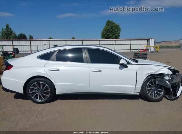5NPEH4J24MH111973 2021 HYUNDAI SONATA Белый Вид задней части салона
