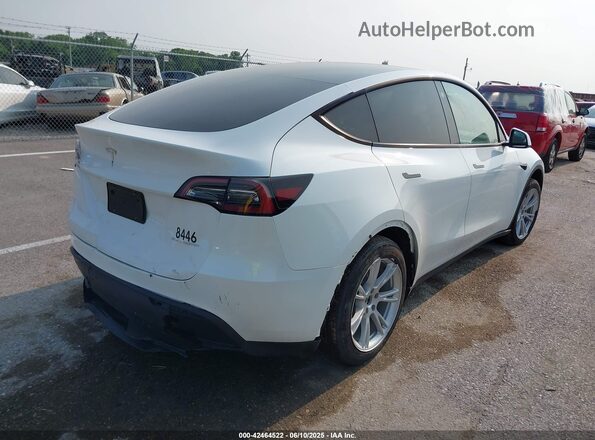 7SAYGAEE2PF648446 2023 TESLA MODEL Y White Rear right