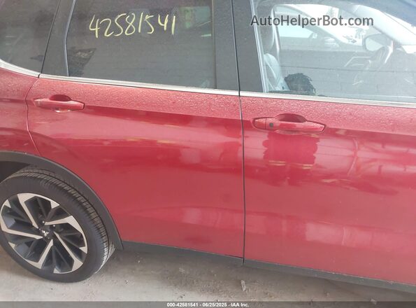 JA4J4UA87PZ022985 2023 MITSUBISHI OUTLANDER Red Widok wnętrza z tyłu