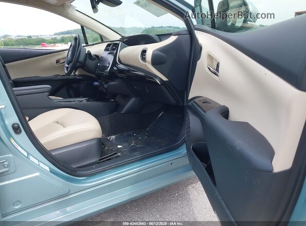 JTDL9MFU8M3022756 2021 TOYOTA LE Light Blue Вид салона спереди