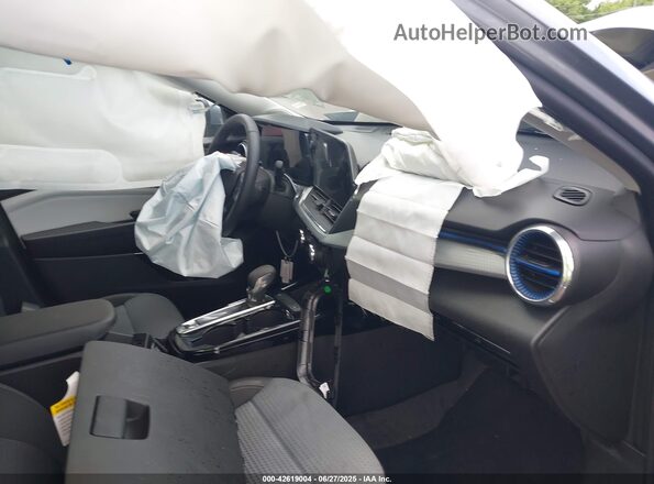 KL77LHEP5SC240377 2025 CHEVROLET TRAX Gray წინა სალონის ხედი