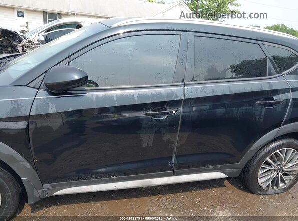 KM8J3CAL4LU101296 2020 HYUNDAI TUCSON Black Vista interior trasera
