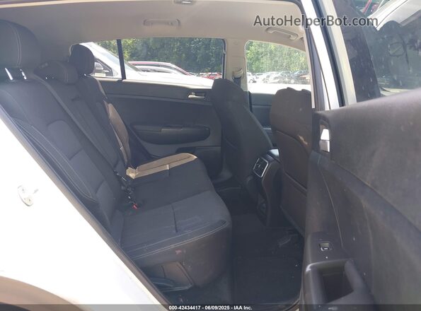 KNDPMCAC1M7932928 2021 KIA SPORTAGE White VIN կոդի պիտակի տեսք