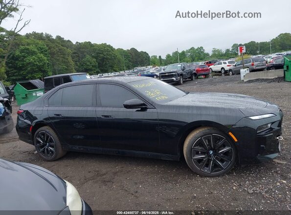 WBA33EJ02RCT04455 2024 BMW 7 SERIES Black Vista interior trasera
