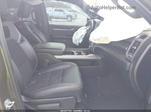 1C6SRFFT1MN669459 2021 RAM 1500 Green Vista interior delantera