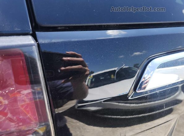 1GNSKMKD8PR221675 2023 CHEVROLET TAHOE Black Շարժիչի բաժամունքի տեսք
