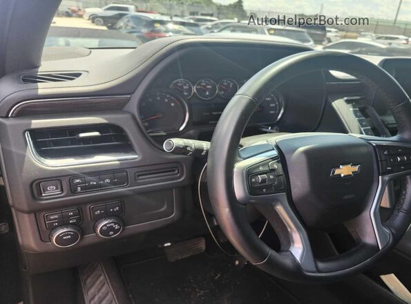 1GNSKMKD8PR221675 2023 CHEVROLET TAHOE Black Սալոնի հետևի տեսք