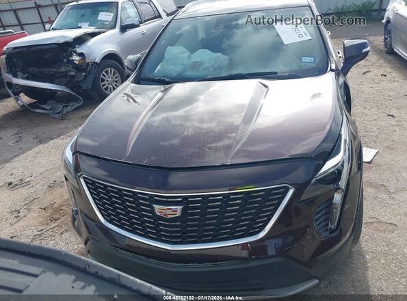 1GYFZCR48MF002387 2021 CADILLAC XT4 Dark Brown 