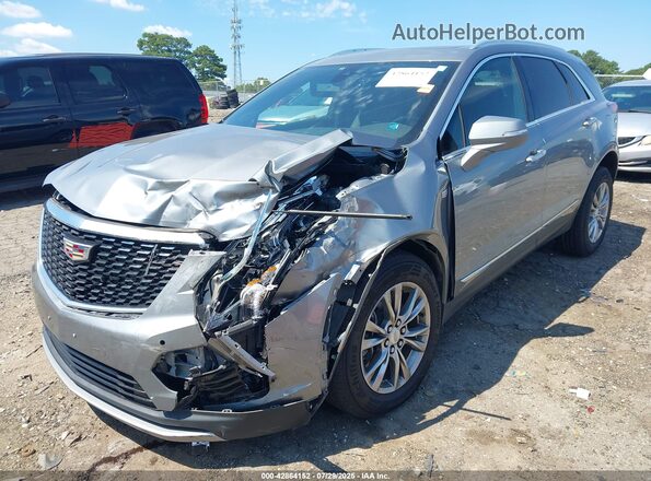 1GYKNDRS8PZ194167 2023 CADILLAC XT5 Желто-коричневый 