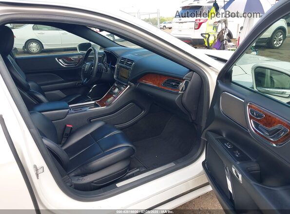 1LN6L9PK9K5604578 2019 LINCOLN CONTINENTA White Vista interior delantera