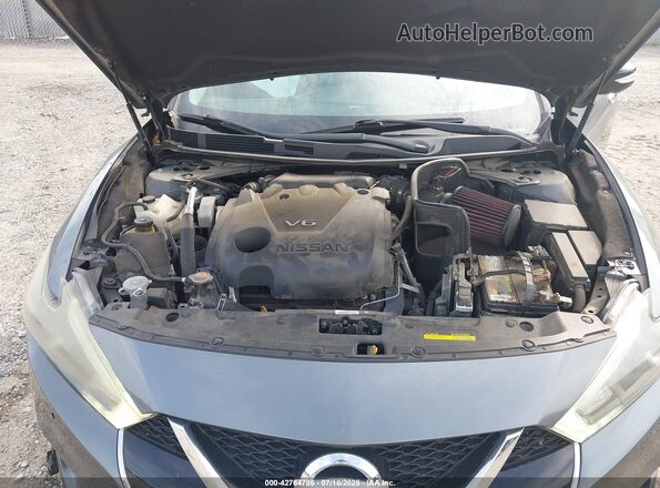 1N4AA6APXJC405644 2018 NISSAN MAXIMA Серебряный Вид сзади